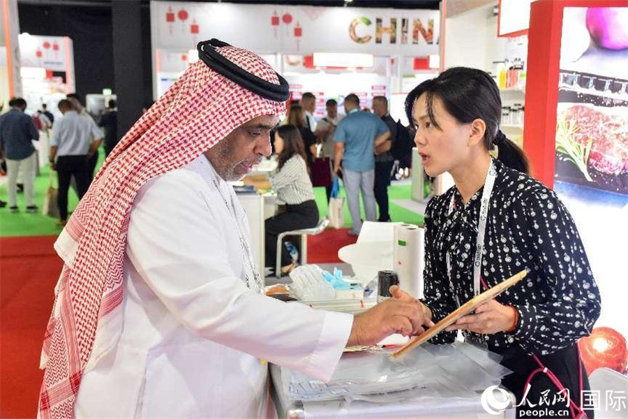 參展商交流。人民網(wǎng)塔里克·易卜拉欣攝