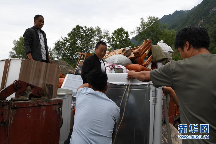 （新華全媒+）（9）千里“挪窩”，踏實(shí)開啟新生活