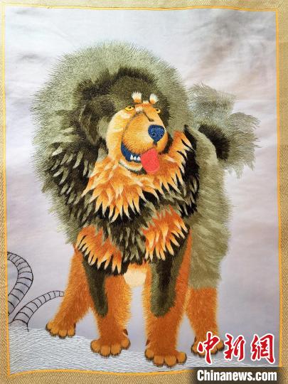 圖為藏繡作品?！∑钤鲚?攝