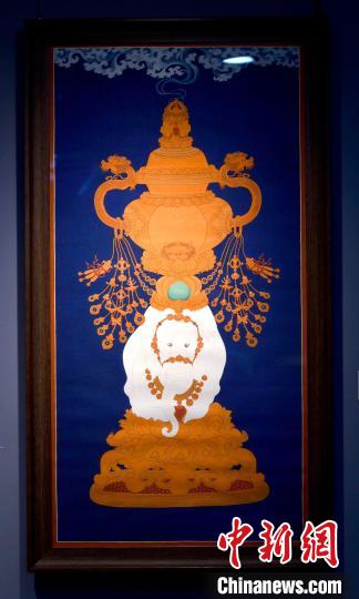 圖為5月16日，展覽中的新創(chuàng)唐卡作品《瑞象承香》?！±盍?攝